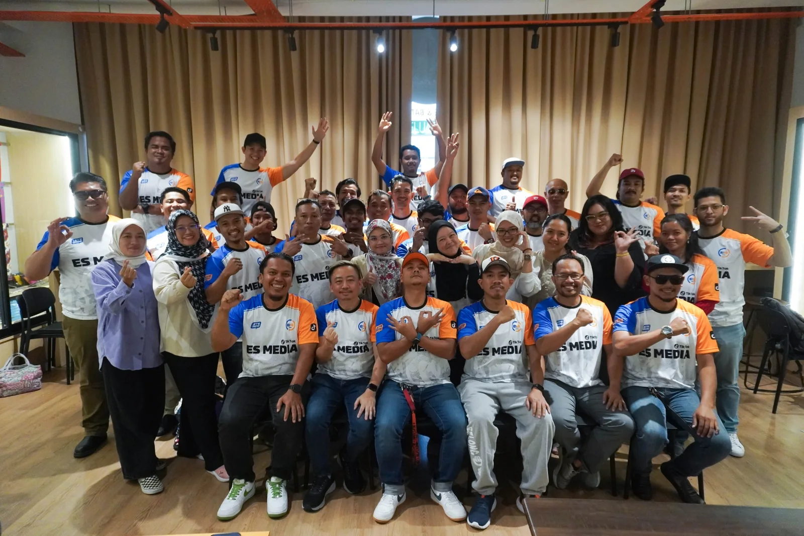 Bro Hafiz with participants and team after a workshop